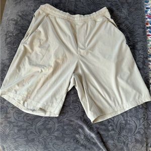 Great condition men’s cream medium Lululemon athletic shorts , no liner, 8.5”i.s